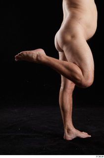 Louis  2 calf flexing nude side view 0005.jpg